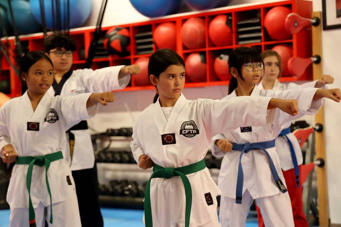 Young students in the CFTP Basic Taekwondo Program practicing in Etobicoke